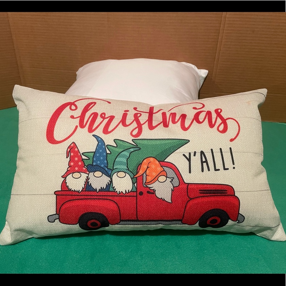 Throw pillow with red truck and gnomes